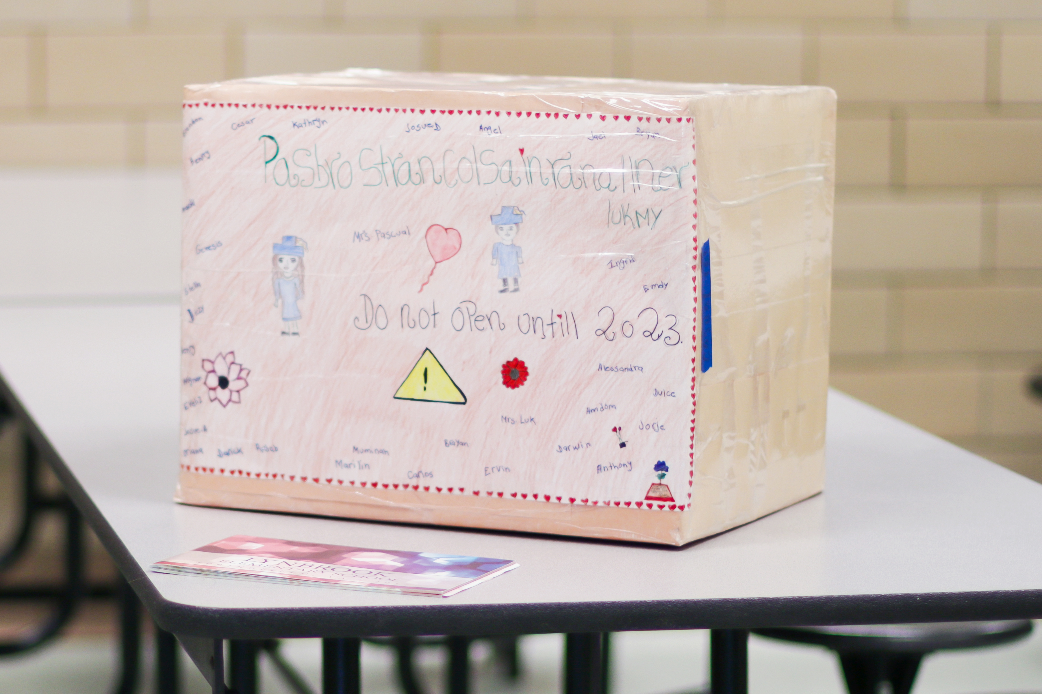 A time capsule box made by Lynbrook Elementary School students in 2017 holds photos, kind words from classmates, academic projects and letters from students to their future selves.
